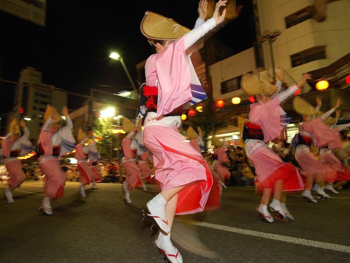 Awa Odori dancers performing in the streets of Tokushima, Shikoku region