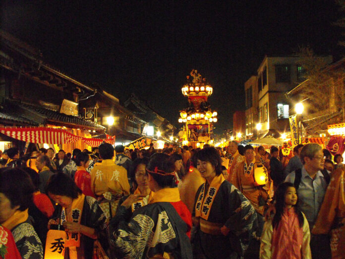 Kawagoe Festival float illuminated at night in the Kurazukuri warehouse district, Kanto