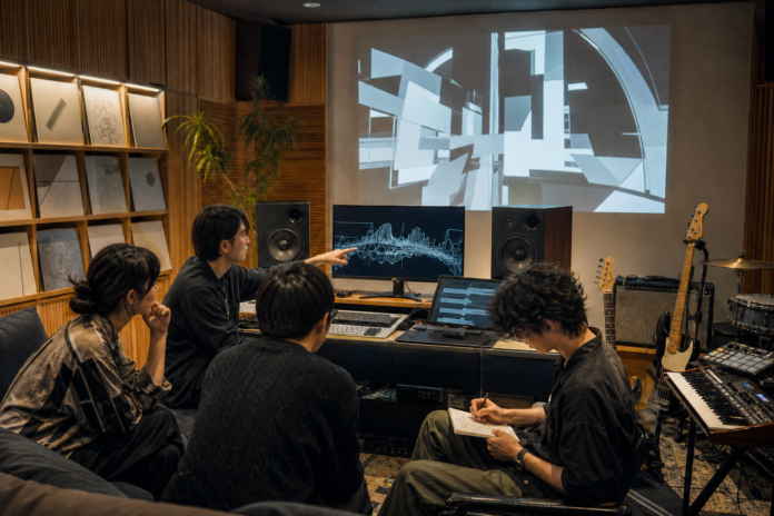 Four non-celebrity music listeners analyze abstract waveforms in a contemporary Japanese studio surrounded by guitar, bass, drums, sampler and keyboard